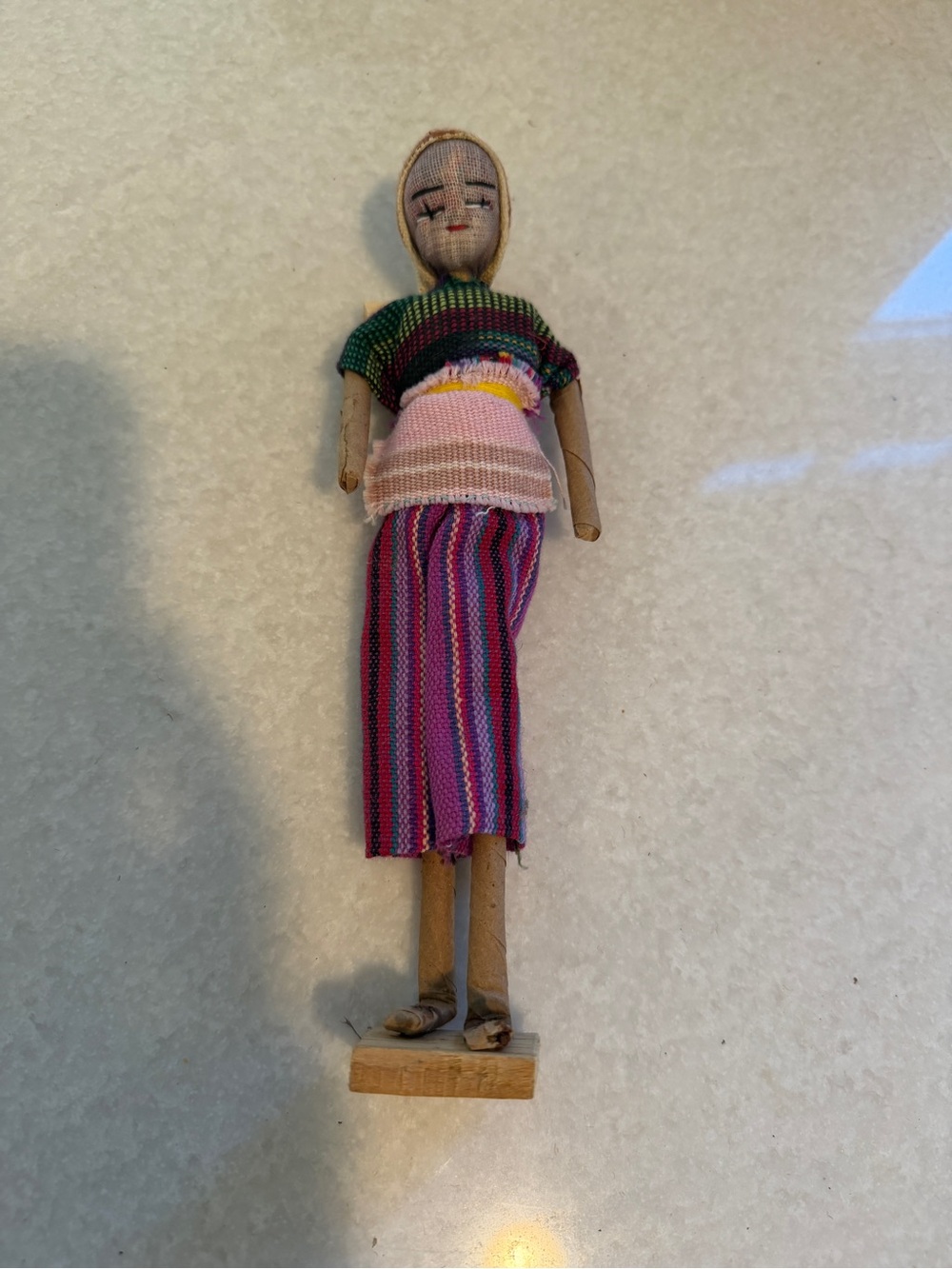 Vintage Multicolor Wooden Folk Doll with Striped Textile Outfit